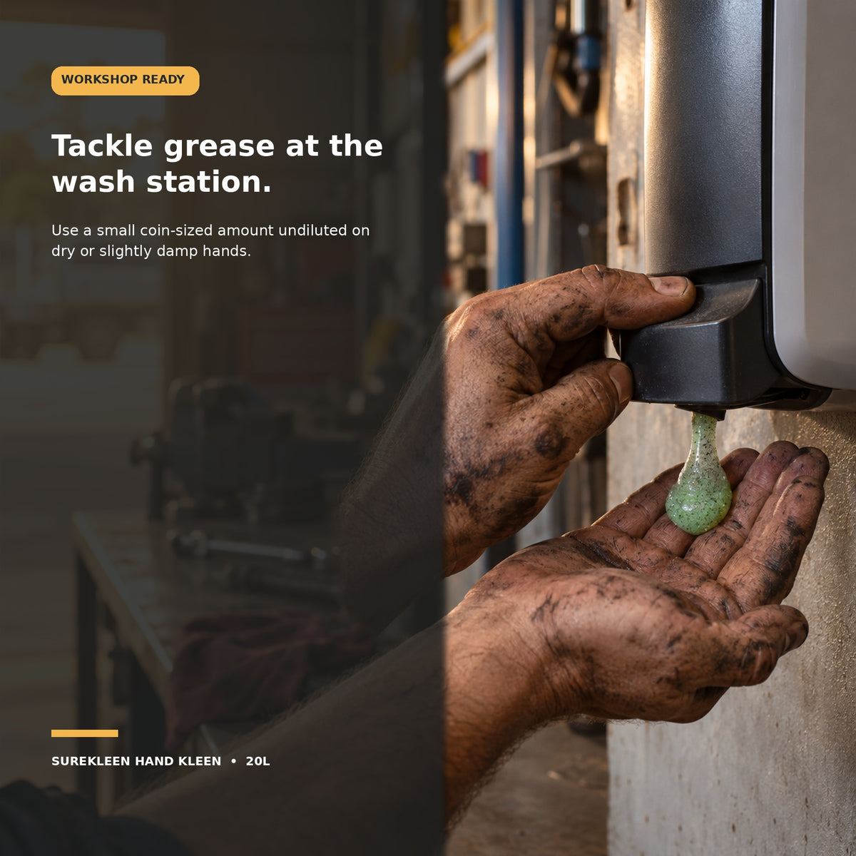 Greasy mechanic hands dispensing green industrial hand cleaner in a workshop
