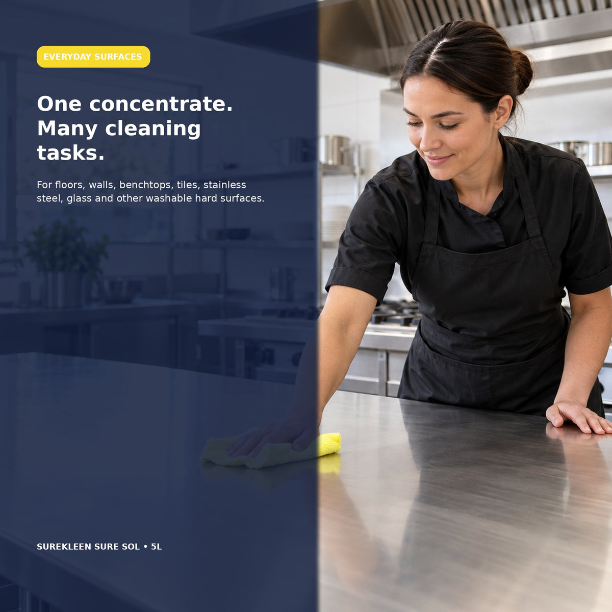 Professional cleaner wiping a stainless steel commercial benchtop
