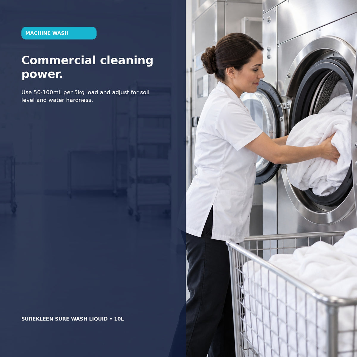 Commercial laundry worker loading white linen into an industrial washing machine
