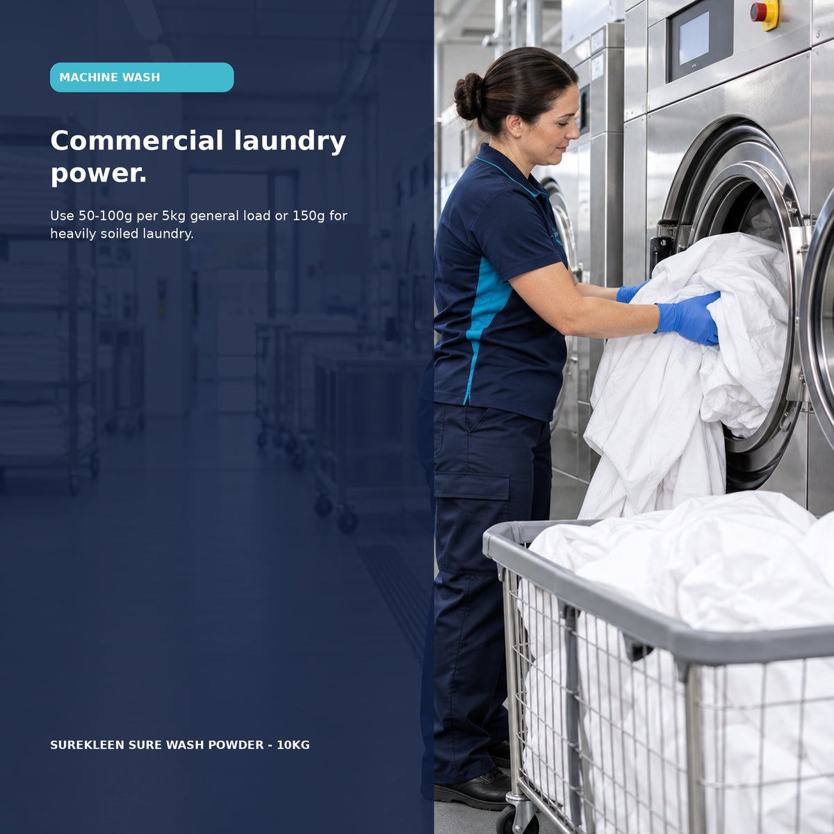 Commercial laundry worker loading white linen into an industrial washing machine
