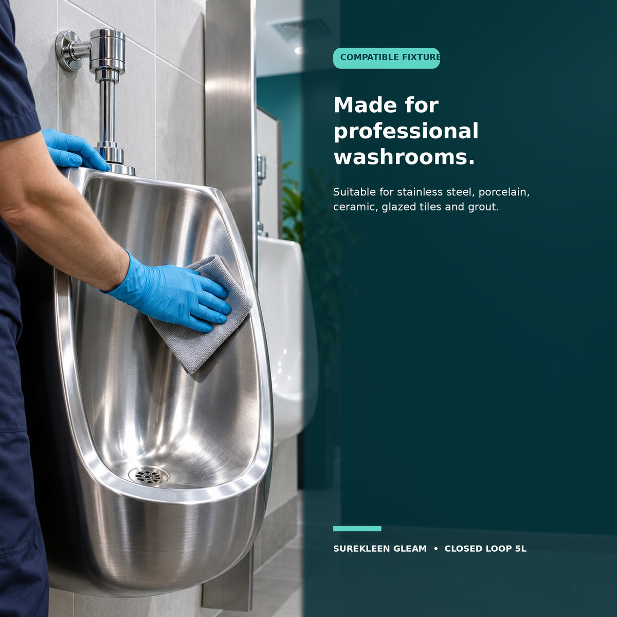 Professional cleaner wiping a stainless-steel commercial urinal
