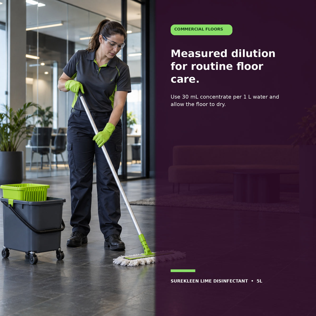 Professional cleaner wiping a commercial wall and benchtop hard surface
