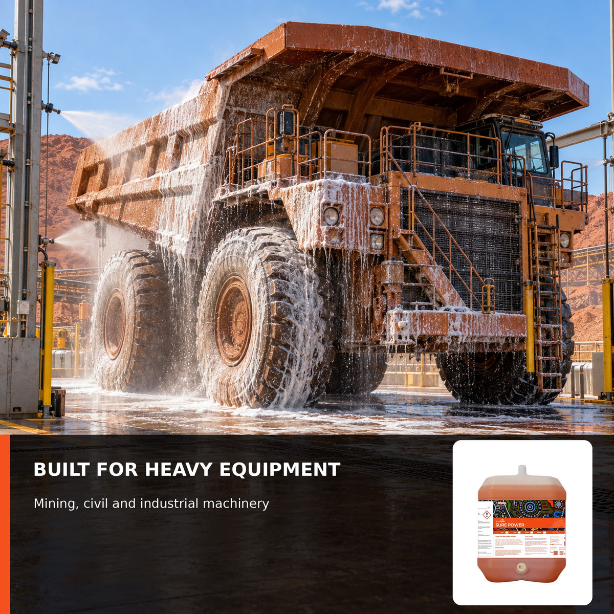 Mining haul truck being cleaned with foaming machinery wash