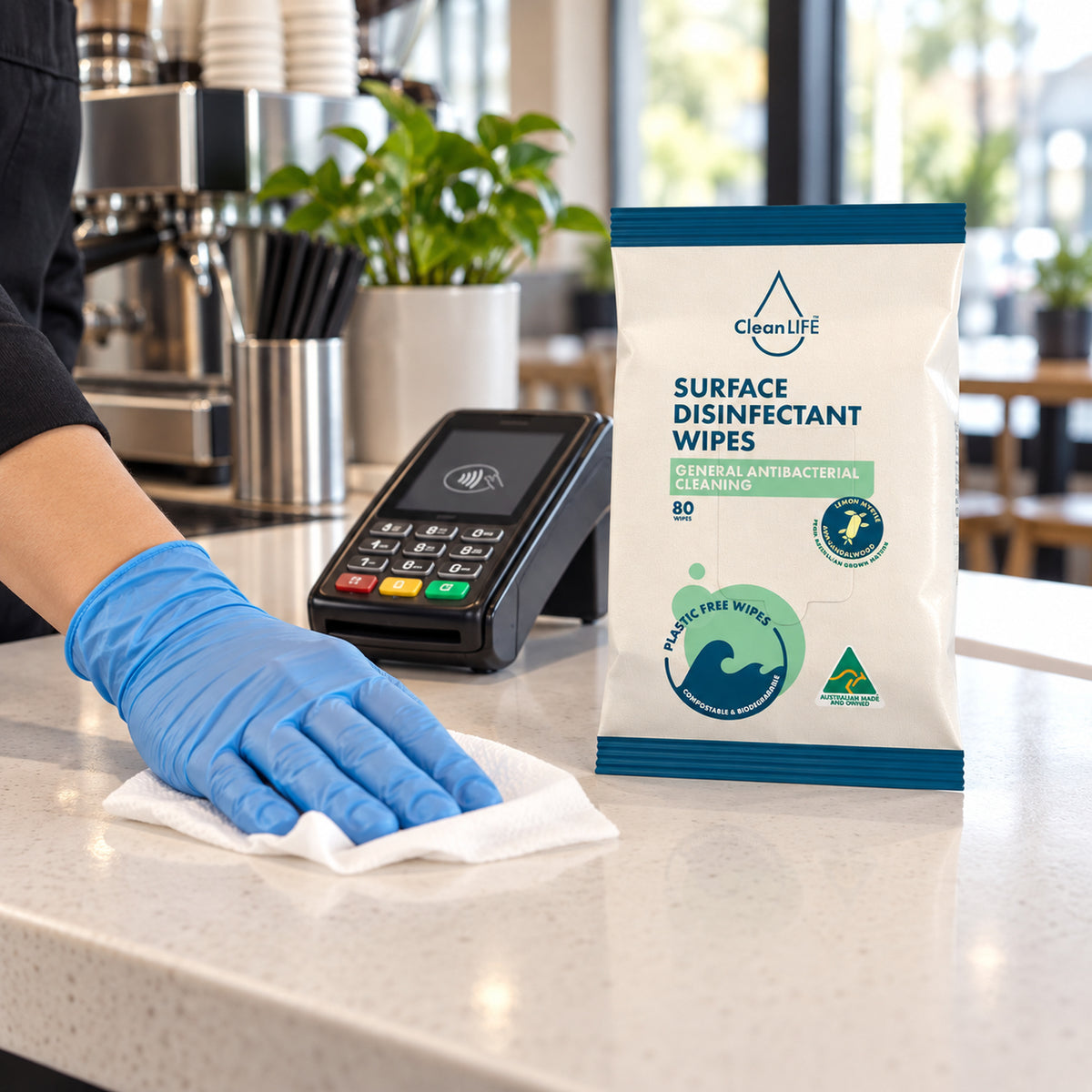CleanLIFE surface wipe cleaning a hospitality service counter
