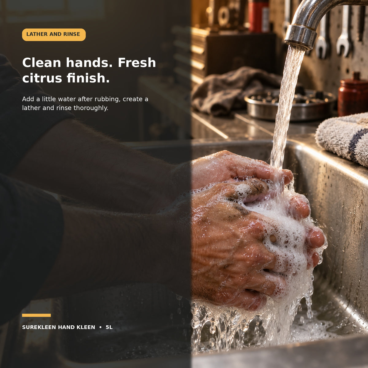 Industrial worker rinsing lathered hands under warm running water
